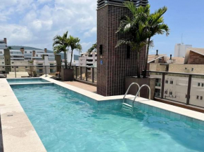 Porto Madero, Condo com Piscina e Academia -Apartamento 3 dorms 8 pessoas- Centro de Bombinhas